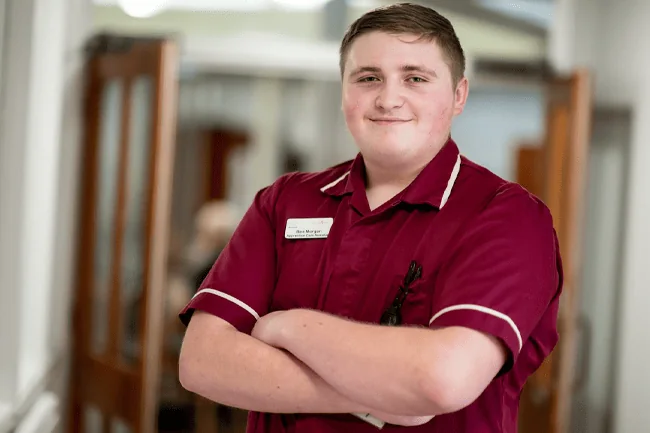 School leaver Ben celebrates completing care apprenticeship